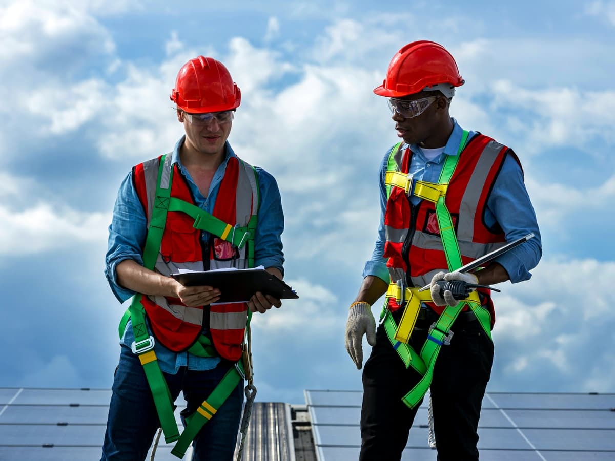 Professional roofer working on a residential roof